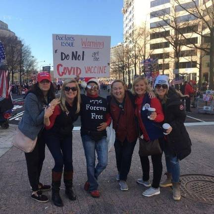 Rita Palma (second from right) of Children’s Health Defense with friends at a health freedom rally. Photo courtesy of Rita Palma