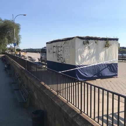 The Chabad sukkah on the East River Esplanade in Carl Schurz Park after it was defaced by vandals on Oct. 1, the last day of the celebratory Jewish holiday of Sukkot. Photo: Chabad of the Upper East Side