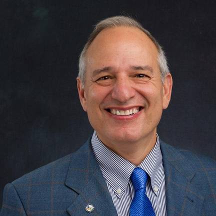 Rick Santos, president and CEO of the not-for-profit Church World Service, said the 80-year-old refugee aid organizations had to make massive cuts to its workforce since the Trump administration cut its funding.