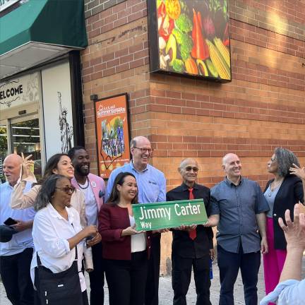 Gathered speakers—including NYC Public Advocate Jumaane Williams, State Assembly Member Harvey Epstein, and Carlina Rivera—celebrate the renaming.