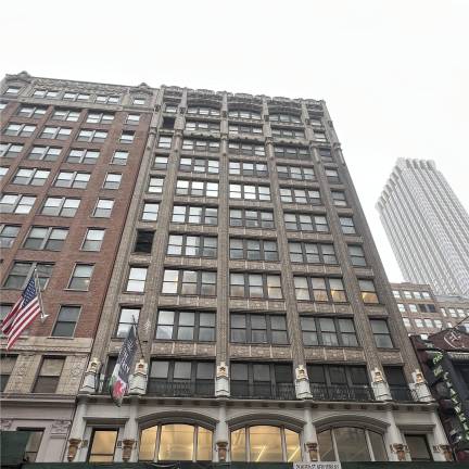 A team of developers plans on conducting an office-to-residential conversion of 29 W. 35th St. (pictured above), which will reportedly yield 107 studio apartment units, 27 of which will be deemed affordable.