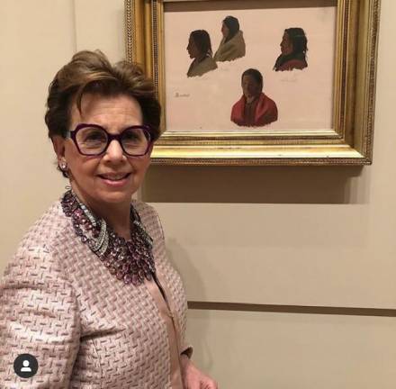 Adrienne Arsht with “Studies of Indian Chiefs Made at Fort Laramie,” which she contributed to the The Met Museum in 2012. Photo courtesy of Adrienne Arsht