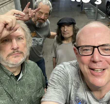 Mazur (center right) was a vocalist for local band The Rasslers.