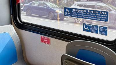 Spots on MTA buses that have been designated as open stroller spaces are marked with a decal.