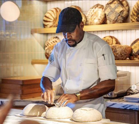 Tin Building baker making the good stuff.