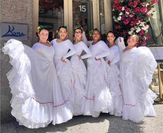 A group of Columbian women pose before the start of NYC Dance Parade.