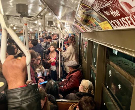 Here’s a straphanger’s view of when the 1930s combine with 2025. The riders probably haven’t changed that much, but now come armed with 21st-century technology.