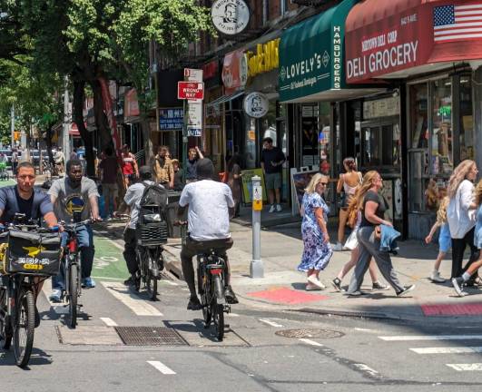 E-bikers frequently disregard one-way traffic signs. This type of reckless e-bike behavior, spotted on the West Side last summer, could eventually be targeted once the NYPD pilot program for its new Quality of Life division expands beyond its first Manhattan precinct on the East Side.