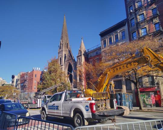 On Dec. 6, 2020, the day after the deadly blaze at Middle Collegiate Church, emergency vehicles worked to clear debris. Congregants still hoped the tower and façade on Second Avenue could be saved. While that did not happen, the church did open a new sanctuary around the corner in time for Easter Sunday, April 20, 2025.