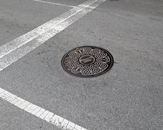 Six people entered a manhole on Park Avenue, near E. 61st Street, on September 23—with two later arrested. Police believe that they were searching for valuables in the sewer system.