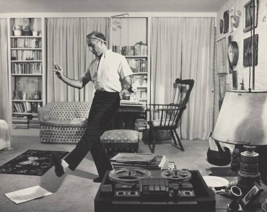 Jerome Robbins dancing in his living room in 1959. Silver gelatin print. Photo: Philippe Halsman. &#xa9;Halsman Archive