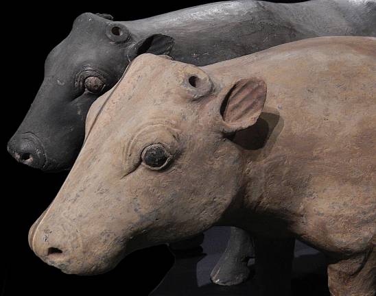 The astonishing realism of this pair of bovines belies their supernatural function. A barnyard full of ceramic livestock provided feasts for the next life. Photo: Adel Gorgy