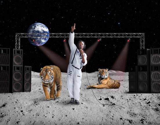 "The whole idea is to aim for the stars, and even if I miss at least I'll land on the moon," said rapper Youngmichael about his photograph for Portrait Project. Photo:Tom McKenzie.