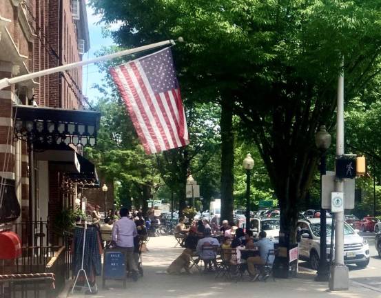 During spring, summer and early fall, Downtown Princeton is teeming with people enjoying the warm weather, and the ability to eat and shop locally. The trees along Nassau Street provide shade, a welcome relief for warmer days. Photo: Ralph Spielman