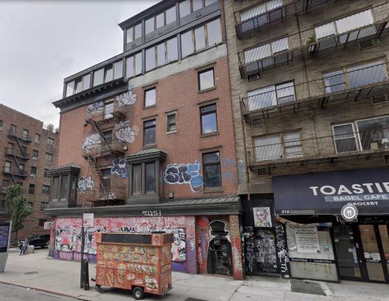 Alleged arsonist Brittany Babb has been indicted for three-alarm blaze that destroyed 210 Seventh Avenue, seen here in Sep. 2024.