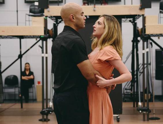 Hannah Cruz, who plays Svetlana, rehearses a scene with Nicholas Christopher, who plays her estranged husband, Anatoly Sergievsky, a disciplined Soviet chess grandmaster.