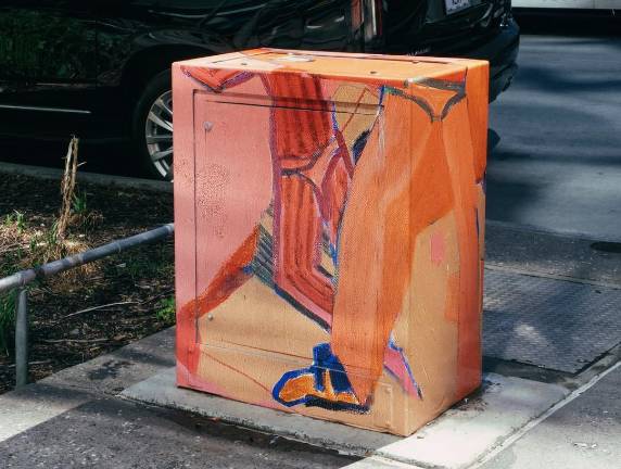 Just one of the Astor Place utility boxes that Village Alliance Director Scott Hobbs now calls “A focal point with community-based art.” Artist Ari Barash’s work will be displayed throughout the summer.