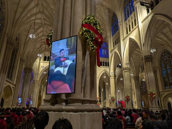 In person and on screen at St. Patrick’s Feast of Our Lady of Guadalupe, Dec. 12, 2025.