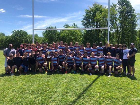 The Xavier high-school rugby state champions, pictured with their trophy held aloft after the big win.