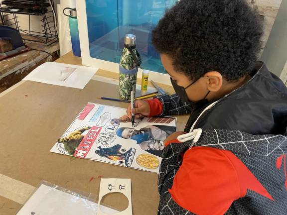 A student in art class at Corlears School. Photo: Christine Walker