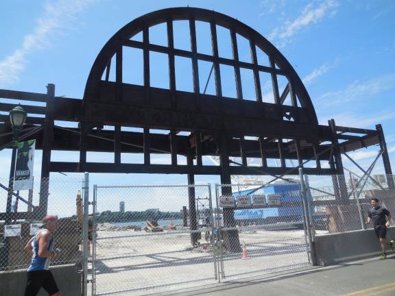 This rusty metal gate is all that remains of the once-grand ship terminal building on Manhattan&#x2019;s Pier 54. Photo by Raanan Geberer