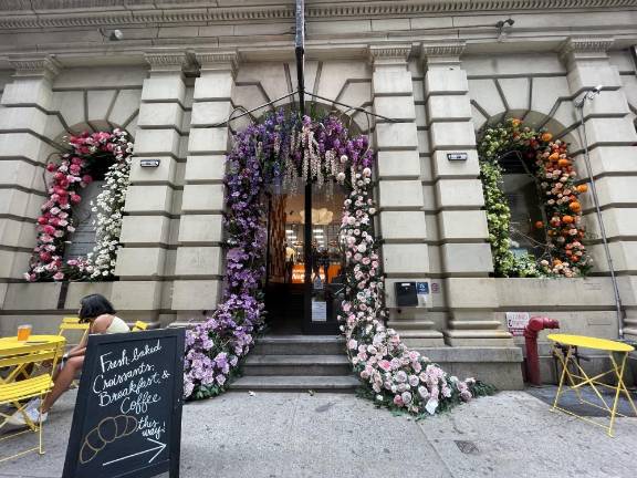 Flowers cascading down windows and entryway. Photo: Shantila Lee