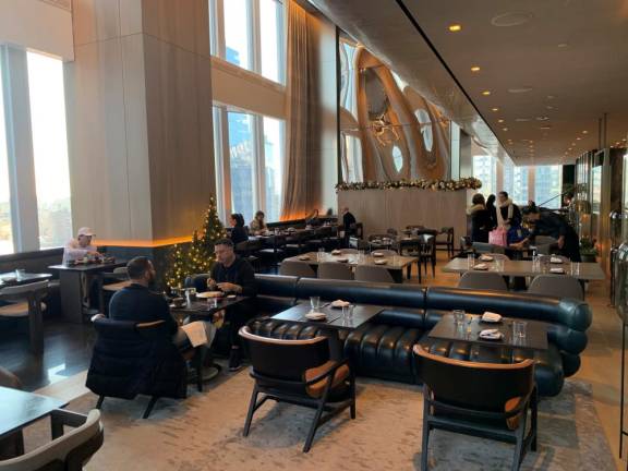 The Equinox, a city resort, is the only hotel in Hudson Yards; it opened in 2019 with 164 rooms and 48 suites. On the 24th floor is full-service dining at Electric Lemon, part of Philadelphia-based Starr Restaurants. A casual setting offers a space for enjoying meals, looking out over the city. Photo: Ralph Spielman