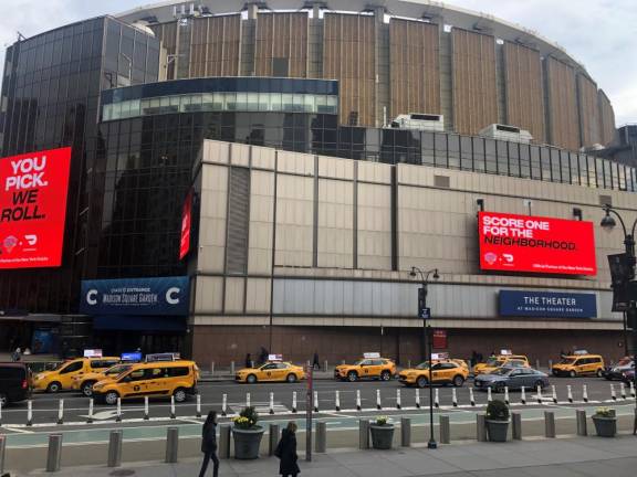 Madison Square Garden said it rejects a Planning Commission idea for it to give up any portion of the arena property at “below fair market value” to help rebuild Penn Station which sits under the world’s most famous arena. But it did express mild support for a plan being pursued by Italian developer ASTM to pay MSG to demolish the Eighth Ave. Theater (above) to rebuild a better Penn Station below. Photo: Keith J. Kelly