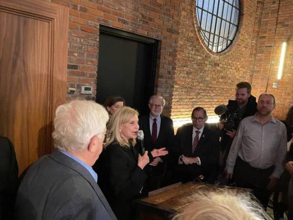 U.S. Rep. Carolyn Maloney (with microphone), with Assembly Member Richard Gottfried (center) and Rep. Jerrold Nadler at the Congresswoman’s campaign kickoff in October. Photo courtesy of Maloney for Congress