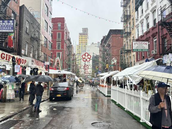 The streets are less crowded and some booths are at half capacity due to a major nor’easter on Sunday.