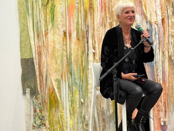 V (formerly known as Eve Ensler) giving the opening night talk at a new gallery exhibit in Chelsea. Photo: Gaby Messino