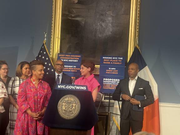 Mayor Eric Adams (right) hailed the cultural leaders who organized the Museum Mile Festival at his weekly press conference at City Hall on the morning of the celebration. Stephanie Wilchfort (at mic) president of the Museum of the City of New York, headed up the Festival Committee.