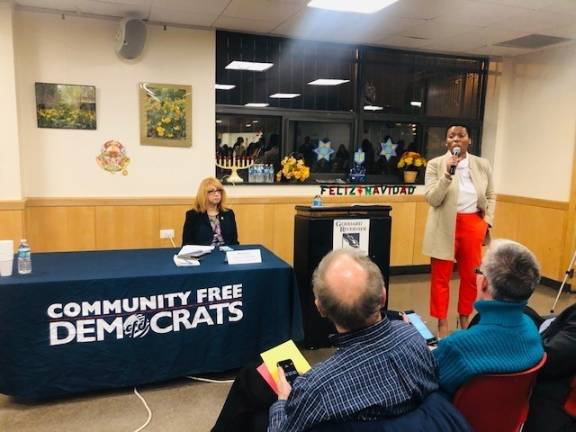 Public advocate candidate Ifeoma Ike speaking (right), with moderator Linda Rosenthal (left). Photo: Erica Overton