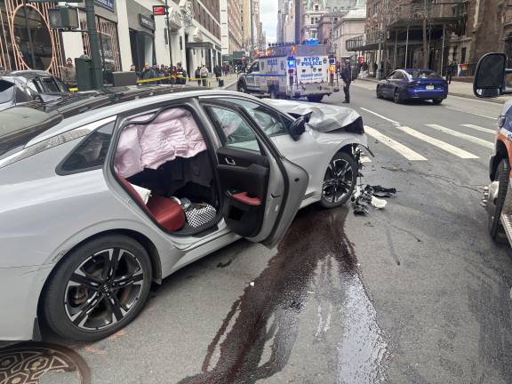 Air bags deployed when the driver of a stolen Kia slammed into a ride share car on the corner of Madison and E. 36th St. on March 5. The alleged car thief was nabbed after trying to flee on foot.