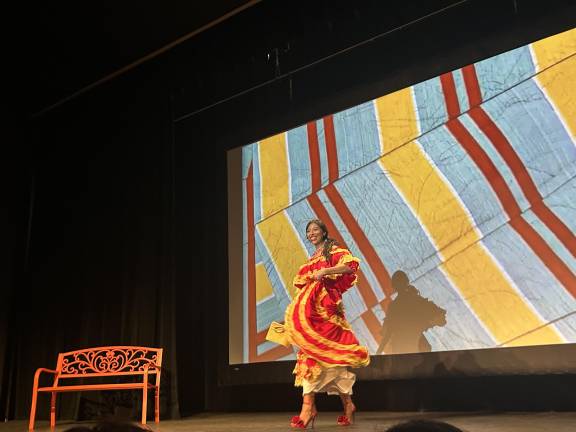 Ana Jimenez walks the runway in a culturally inspired look.
