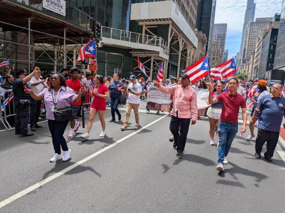 Puerto Rican Day Parade included Congressman Adriano Espaillat marching.