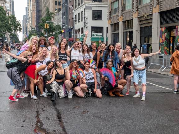Dyke March unmasked, and smiling, as most participants and nearly all spectators were.