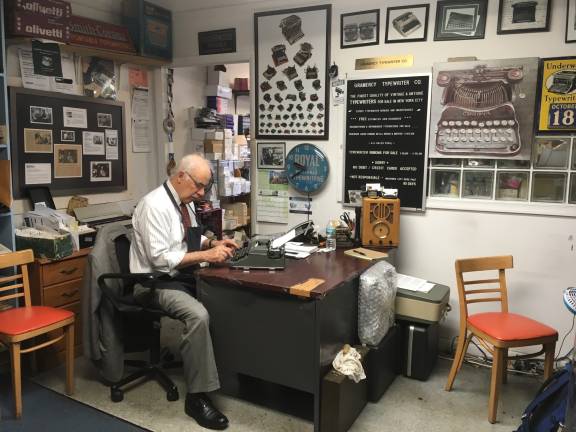 Paul Schweitzer at his desk at Gramercy Typewriter Co. Photo: Dan Whateley
