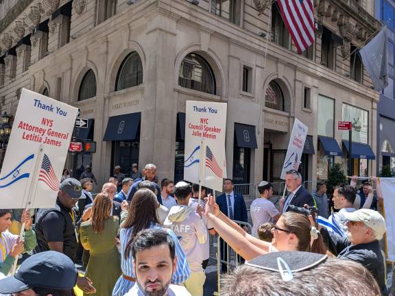 Israel Day Parade signs thanking Letitia James, Julie Menin, Tom DiNapoli.