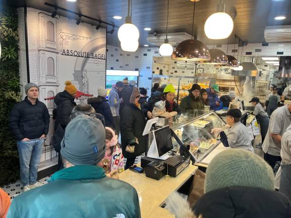 On the second day of operation, line management had been refined, New Absolute Bagels will expand their hours after Jan. 4, open from 6 a.m. to 3 p.m. every day of the week.