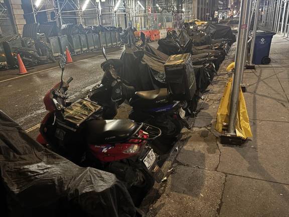 Congregation of e-bikes parked outside the Redbury hotel migrant shelter has been an ongoing source of complaints from residents at the Midtown South Community Council meetings.