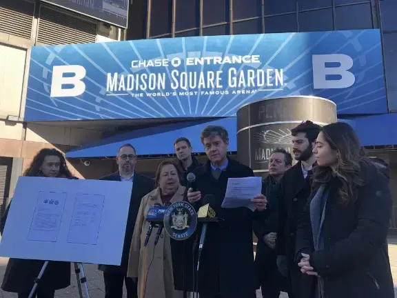 When Assembly member Tony Simone (third from right) joined other lawmakers critical of James Dolan’s use facial recognition software at Madison Square Garden, he was disinvited from a Rangers Pride Night Game where he was supposed to drop the puck.
