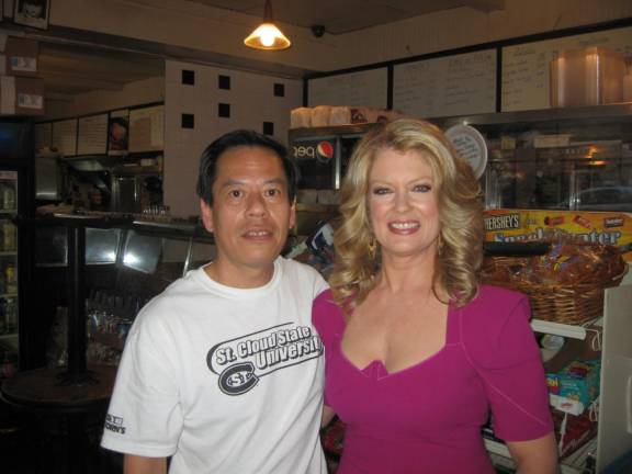 Rupert Jee with Mary Hart in the deli. Photo courtesy of Rupert Jee