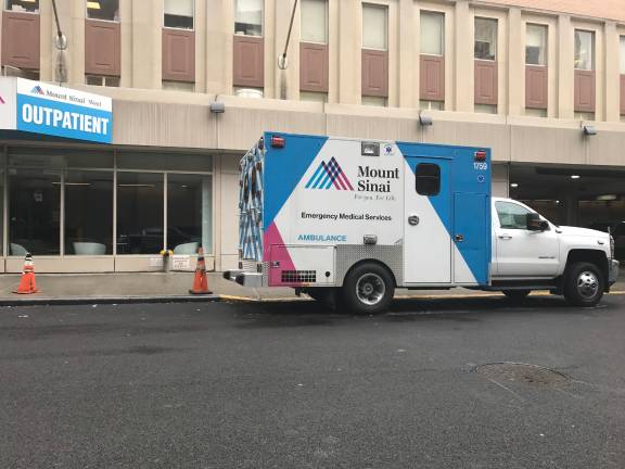 An ambulance on West&#xa0;59th Street between Ninth Avenue and Tenth Avenue after transporting a patient to the emergency room of Mount Sinai West on Sunday, February 4th. Photo: Douglas Feiden&#xa0;