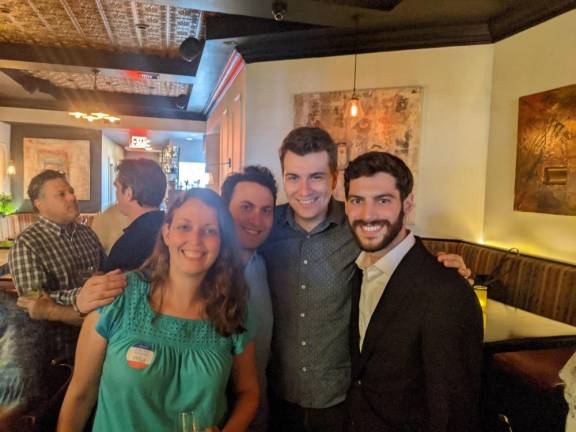 At Sojourn Social (front, left to right): Kim Moscaritolo, Jeremy Berman, Gabe Panek and Alex Bores. Photo: Paul Newell