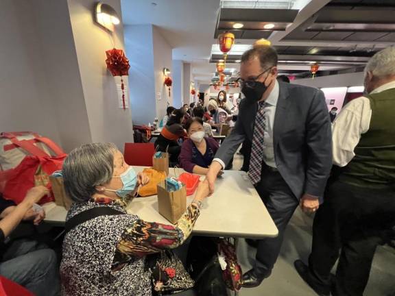 Manhattan Borough President Mark Levine at the Chinese-American Planning Council Open Door Senior Center to give away COVID safety bags filled with home tests, masks, a digital thermometer and sanitizer. Photo: Mark D. Levine on Twitter
