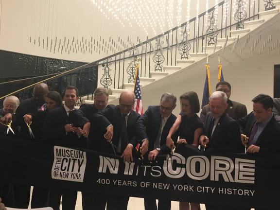 Museum of the City of New York administrators and elected officials at a Tuesday morning ribbon cutting of a permanent exhibit, “New York at its Core,” that will be open for 32 hours straight beginning Saturday morning. Photo: Madeleine Thompson