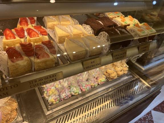 Ferrara’s Café is busily preparing for the Feast a week in advance. The bakery will sell and give away its famous cannoli — plus myriad other baked goods — at the festival. Photo: Kay Bontempo