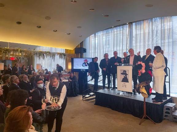 Chefs, including Daniel Boulud (right), led a toast in honor of Greene. Photo: Abigail Gruskin