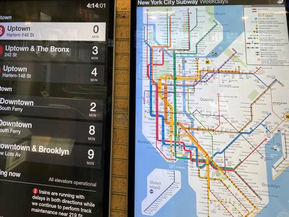 New digital displays can show delays and arrivals adjacent to the new subway map.